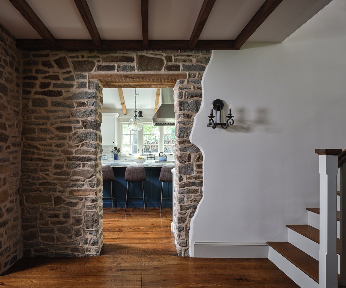Historic entryway into modern kitchen crafted by custom home builder Bucks County PA